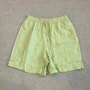 ⭐️ Clio high rise light green silk shorts in size medium